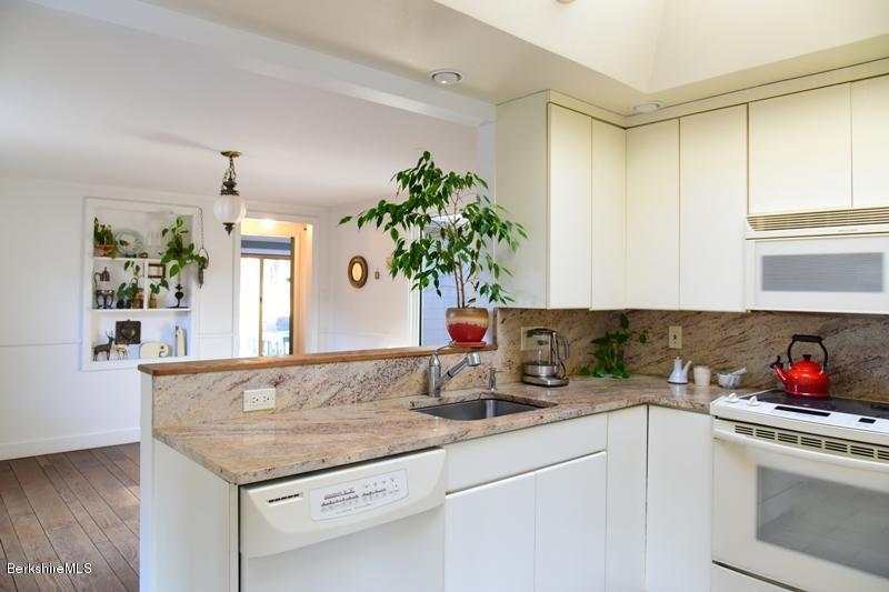 142 Polikoff Road Sheffield, MA 01222 - Photo 11 of 26 a kitchen with sink and cabinets