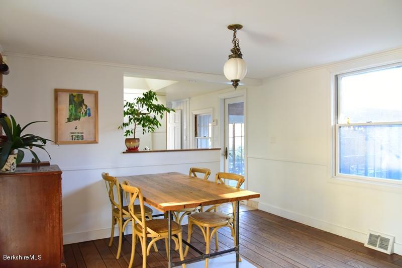 142 Polikoff Road Sheffield, MA 01222 - Photo 12 of 26 a view of a dining room with furniture and wooden floor