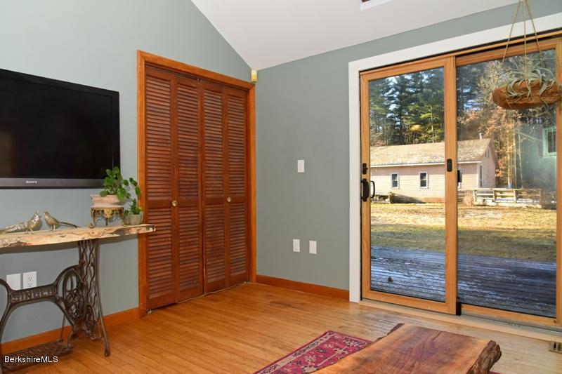 142 Polikoff Road Sheffield, MA 01222 - Photo 15 of 26 a view of a livingroom with furniture and front door