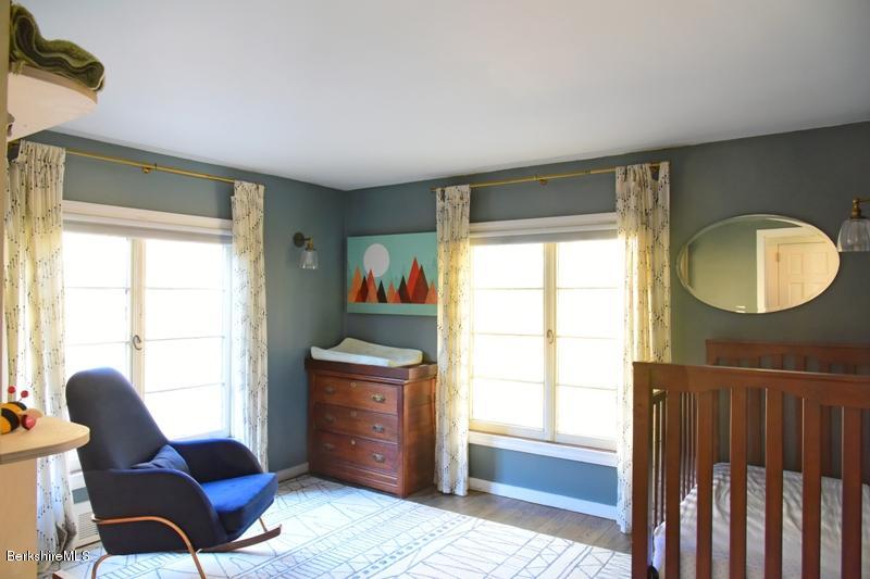 142 Polikoff Road Sheffield, MA 01222 - Photo 19 of 26 a living room with furniture and a window