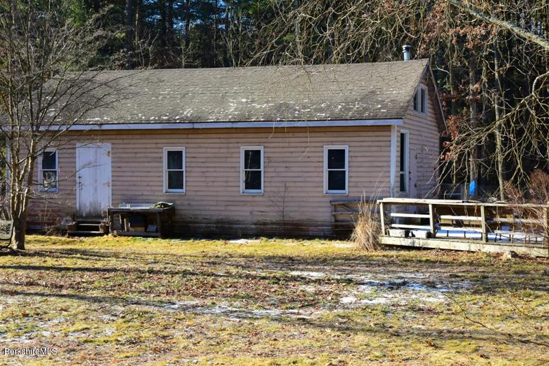 142 Polikoff Road Sheffield, MA 01222 - Photo 22 of 26 a view of a house with a yard