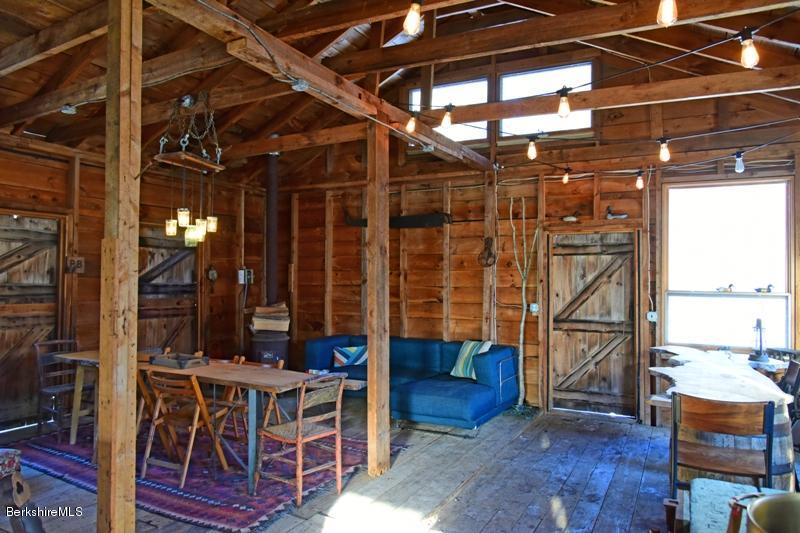 142 Polikoff Road Sheffield, MA 01222 - Photo 23 of 26 a view of entryway with wooden floor