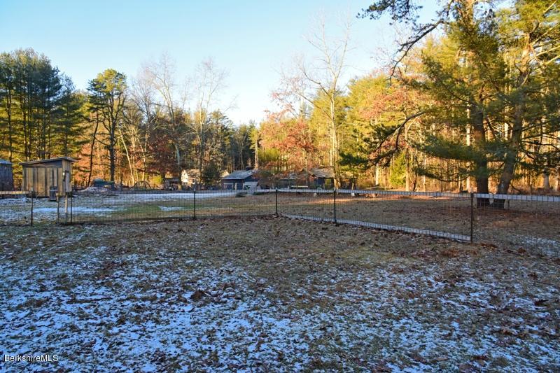 142 Polikoff Road Sheffield, MA 01222 - Photo 25 of 26 a backyard of a house with lots of green space