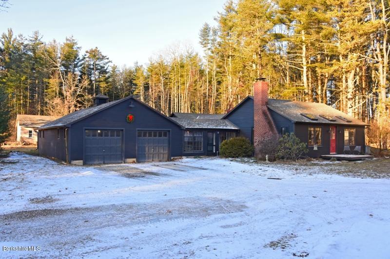 142 Polikoff Road Sheffield, MA 01222 - Photo 26 of 26 a wooden house with trees in front of it