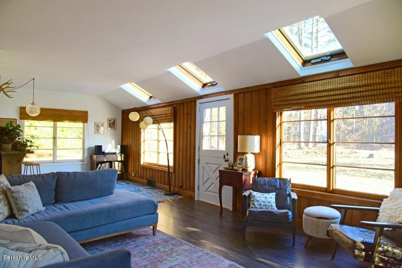 142 Polikoff Road Sheffield, MA 01222 - Photo 6 of 26 a living room with furniture and a large window