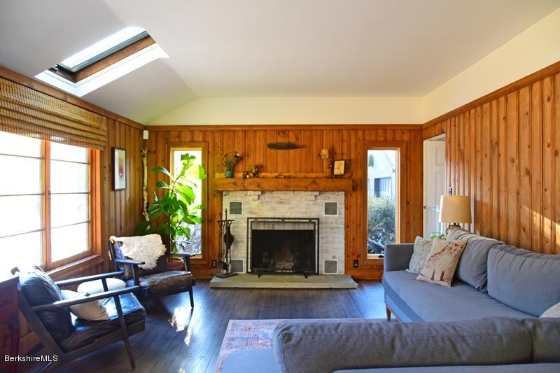 142 Polikoff Road Sheffield, MA 01222 - Photo 7 of 26 a living room with furniture and a fireplace
