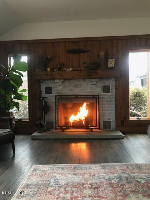 142 Polikoff Road Sheffield, MA 01222 - Photo 8 of 26 a view of a fireplace with wooden floor