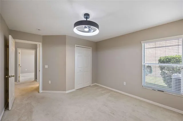 a room with sliding glass door