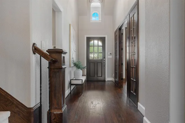 a view of entryway with wooden floor