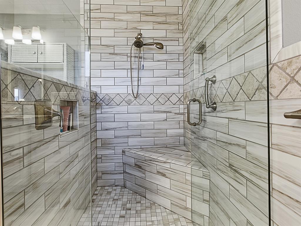 5588 Gulf Stream Street Tavares, FL 32778 - Photo 22 of 44 a bathroom with a shower