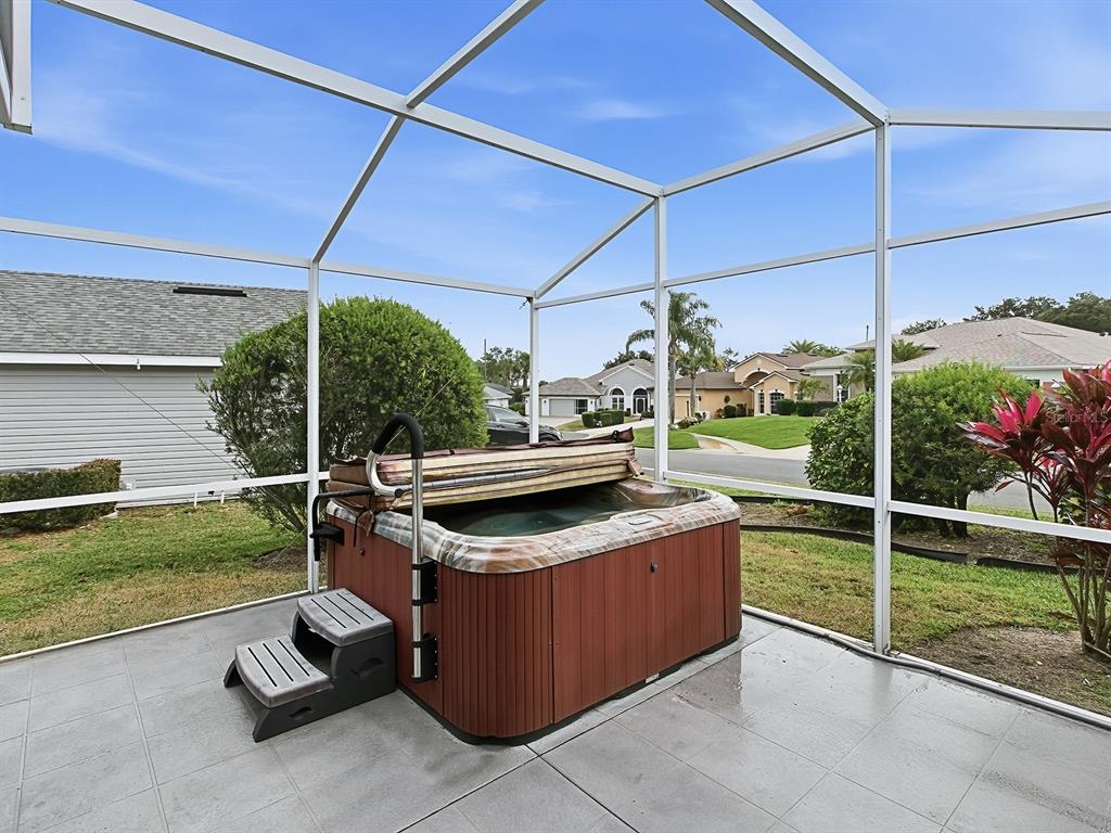 5588 Gulf Stream Street Tavares, FL 32778 - Photo 33 of 44 a view of a patio with a yard