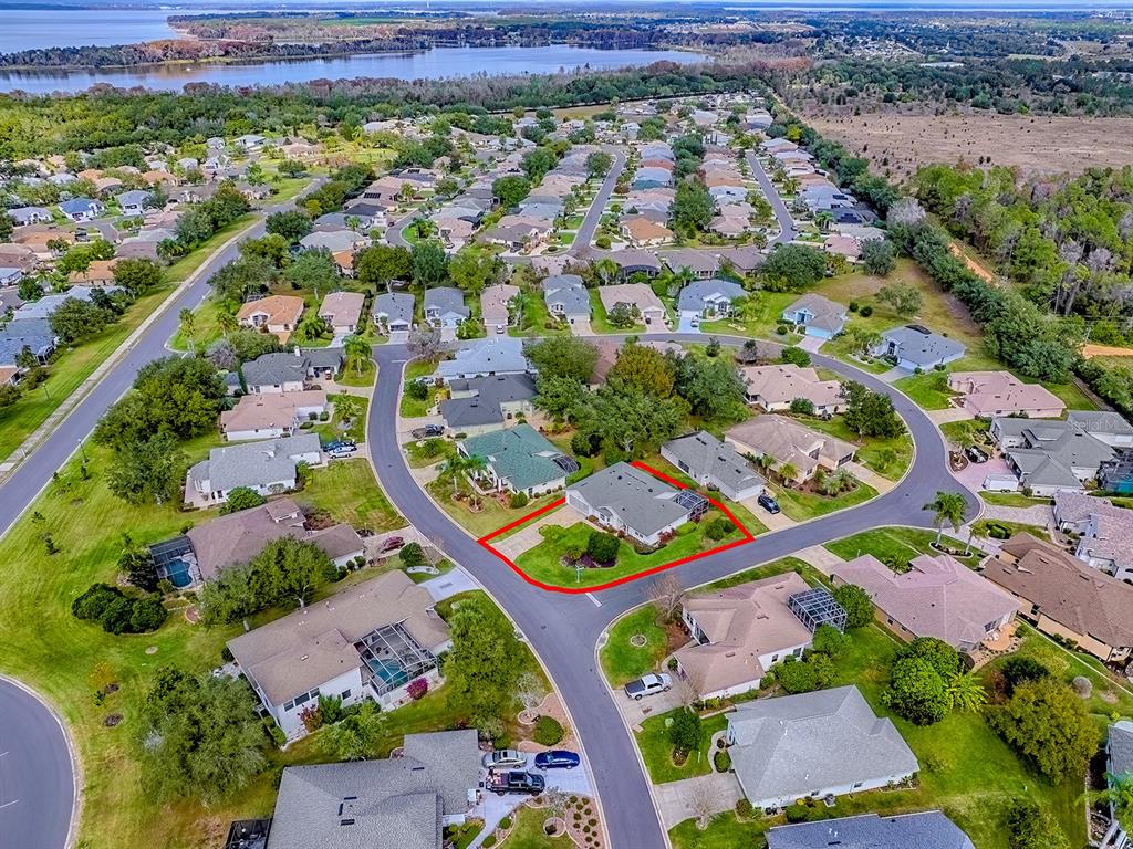 5588 Gulf Stream Street Tavares, FL 32778 - Photo 42 of 44 an aerial view of a city