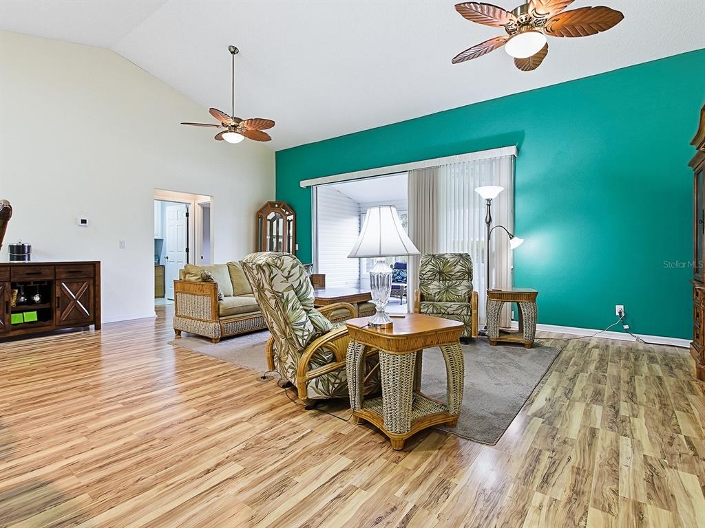 5588 Gulf Stream Street Tavares, FL 32778 - Photo 8 of 44 a living room with furniture