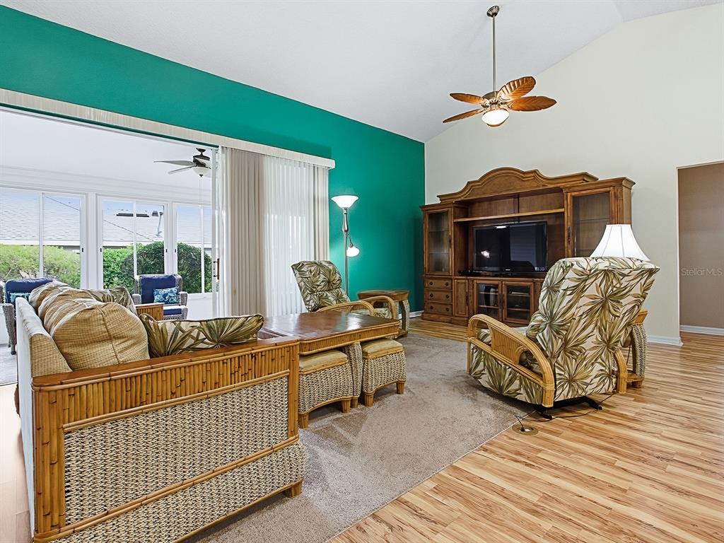 5588 Gulf Stream Street Tavares, FL 32778 - Photo 9 of 44 a living room with furniture