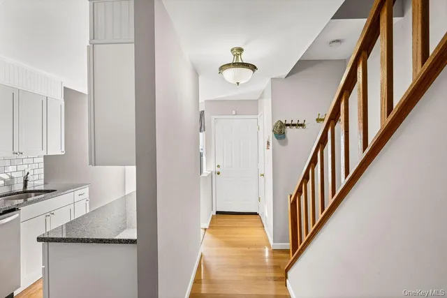 a view of a swimming pool with outdoor seating