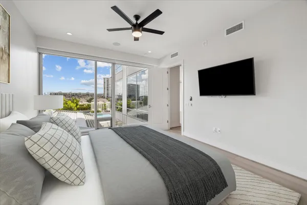 a kitchen that has a sink and a stove in it