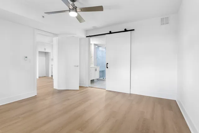 a view of a swimming pool with outdoor seating