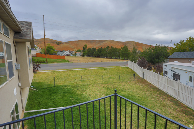 426 Deer Hollow Road Tooele, UT 84074 - Photo 36 of 37 View of yard featuring a mountain view