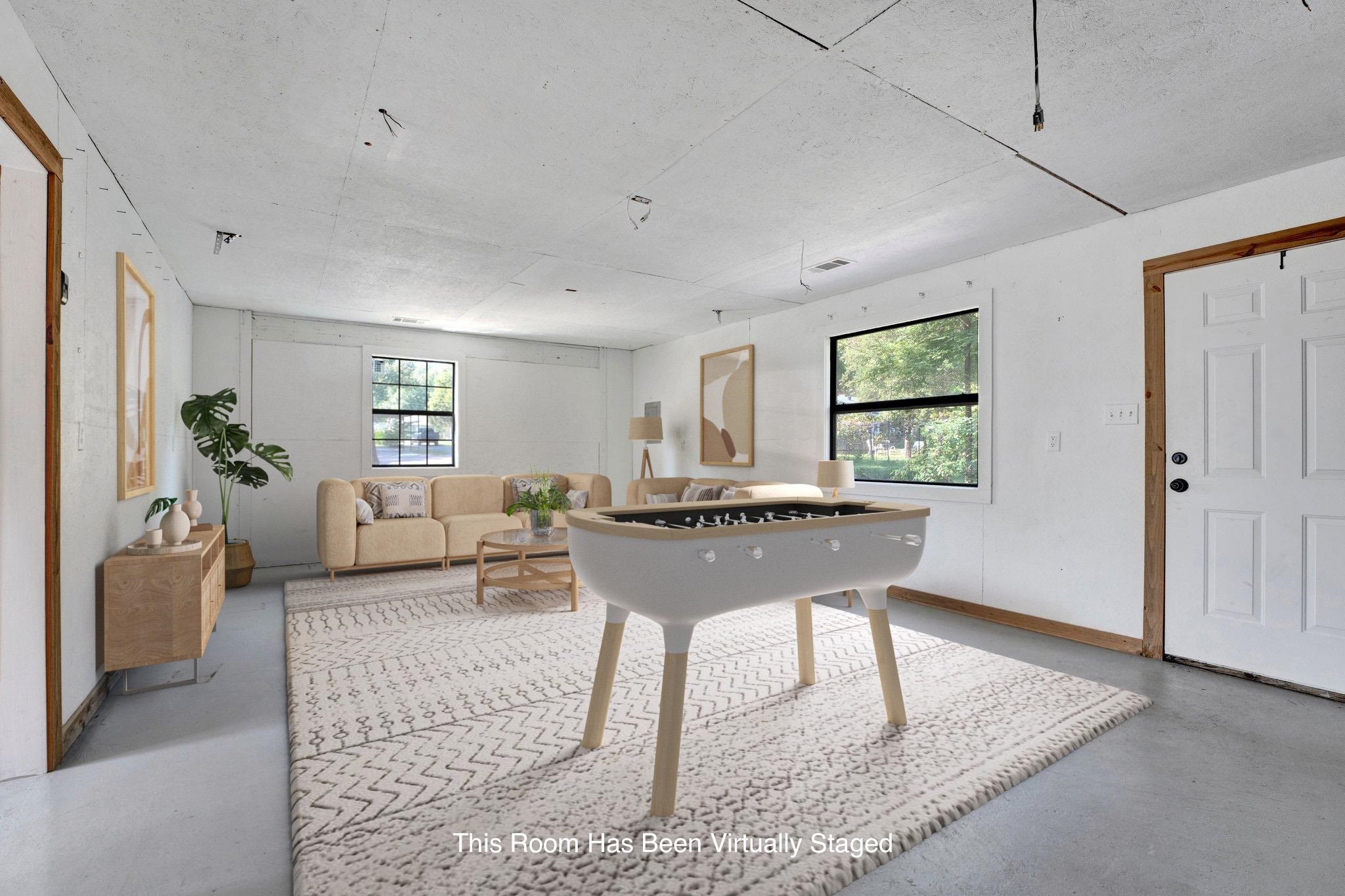 1300 Mullins Station Road Memphis, TN 38134 - Photo 23 of 34 Rec room featuring a healthy amount of sunlight
