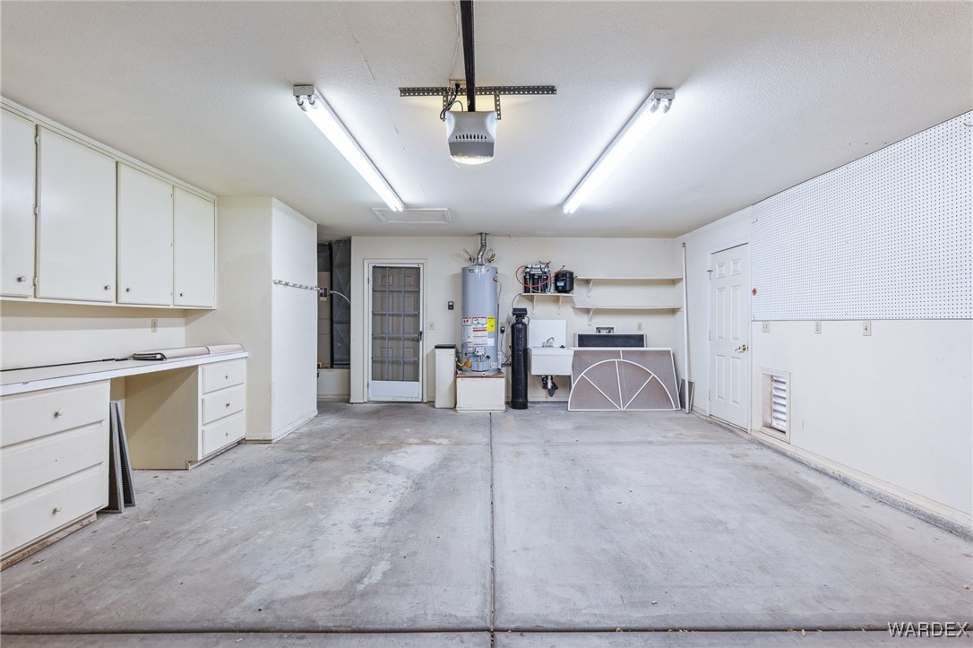 5967 Mountain View Road Fort Mohave, AZ 86426 - Photo 15 of 18 a view of a kitchen with appliances and cabinets