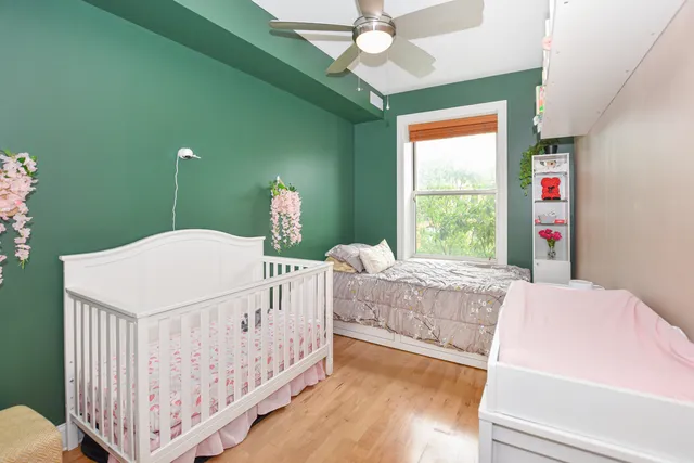 a bathroom with a toilet a sink and a mirror