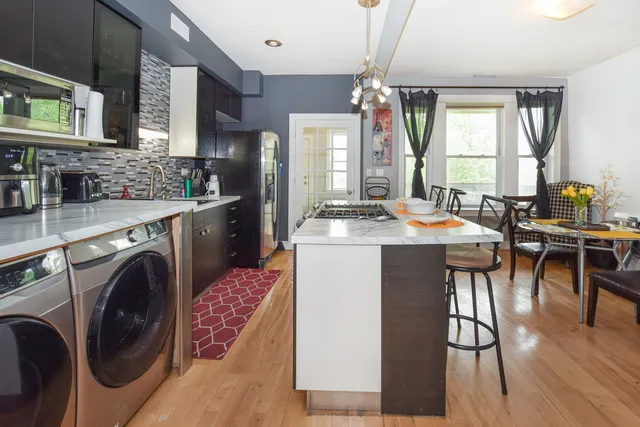 a view of a dining room with furniture