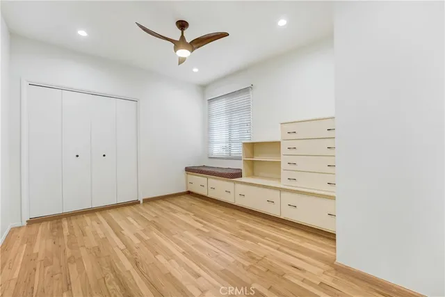 an empty room with cabinet