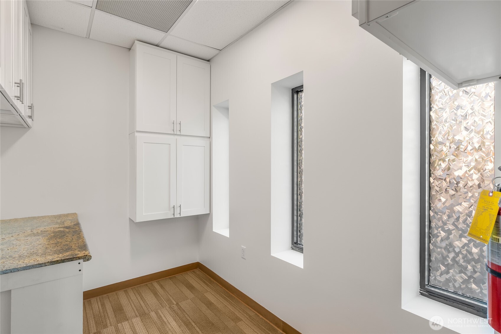 1207 North 152nd Street, Unit C Shoreline, WA 98133 - Photo 6 of 17 a view of kitchen and utility room