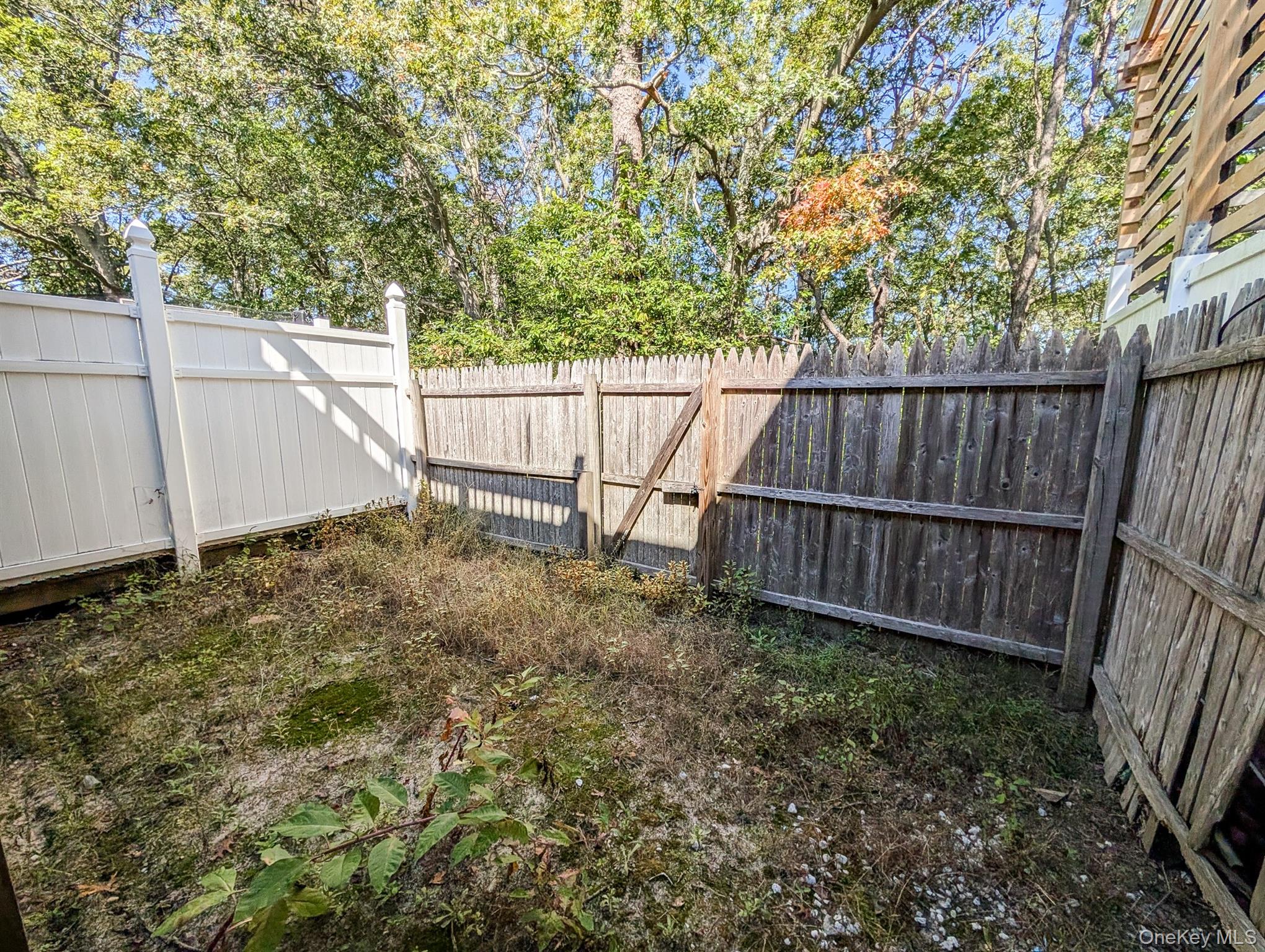 136 Hill Crescent Calverton, NY 11933 - Photo 19 of 21 View of fenced backyard