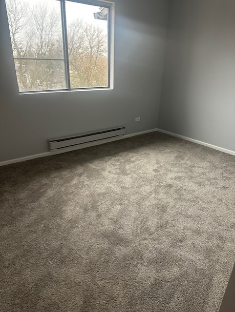 651 South Virginia Road, Unit 326 Crystal Lake, IL 60014 - Photo 9 of 9 an empty room with a window