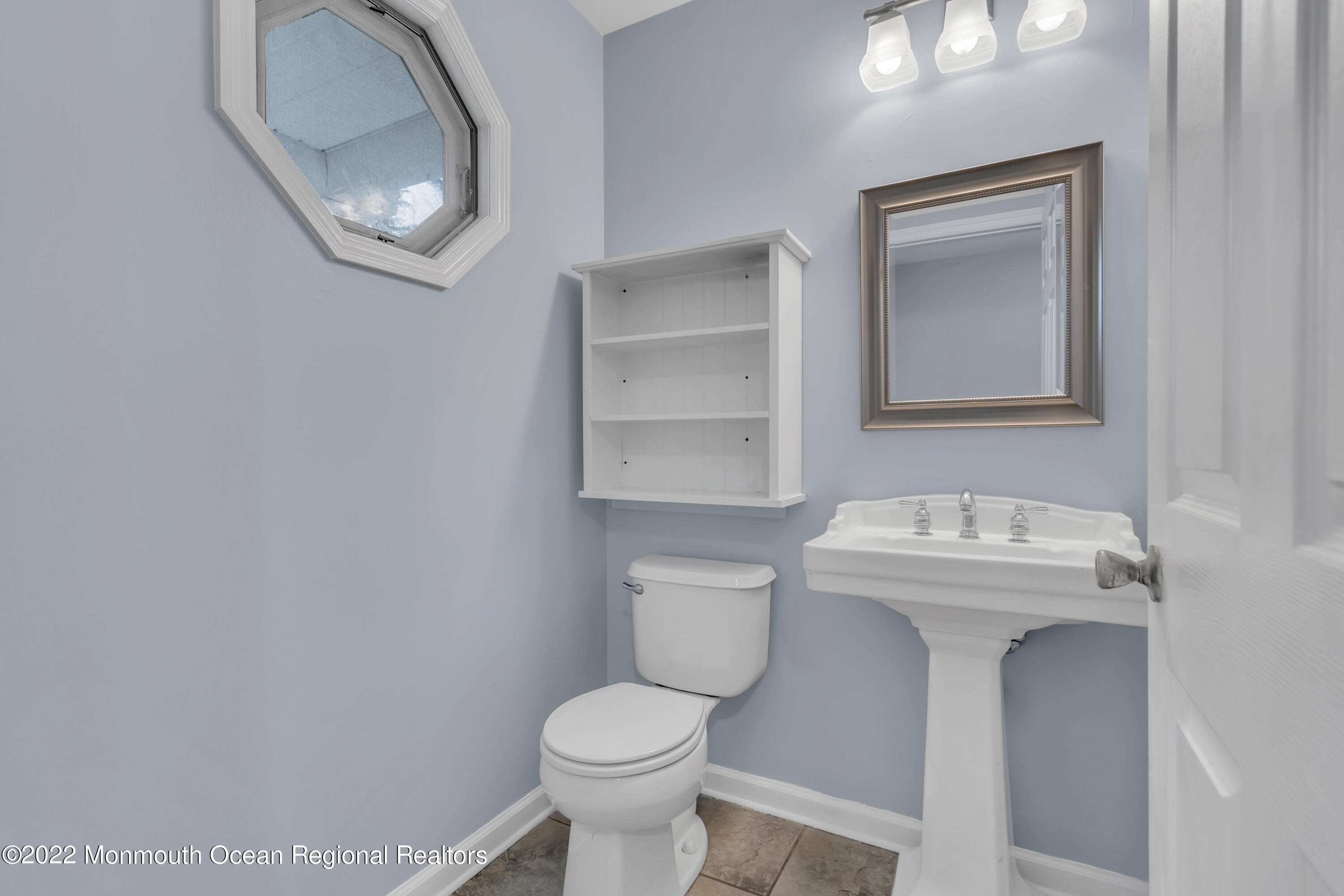 145 Gunwale Road Manahawkin, NJ 08050 - Photo 13 of 44 a bathroom with a sink and a toilet