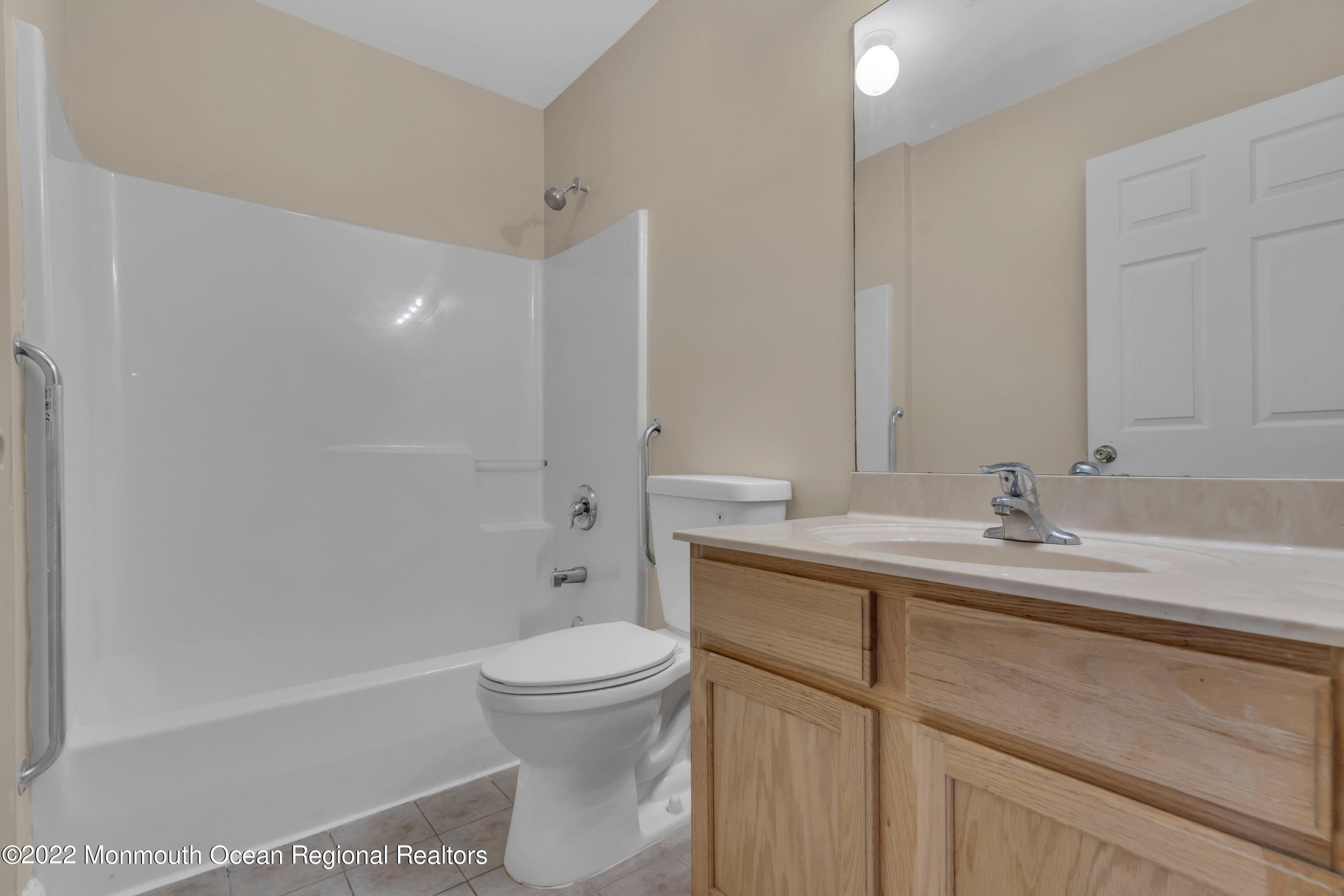 145 Gunwale Road Manahawkin, NJ 08050 - Photo 28 of 44 a bathroom with a sink a toilet and shower
