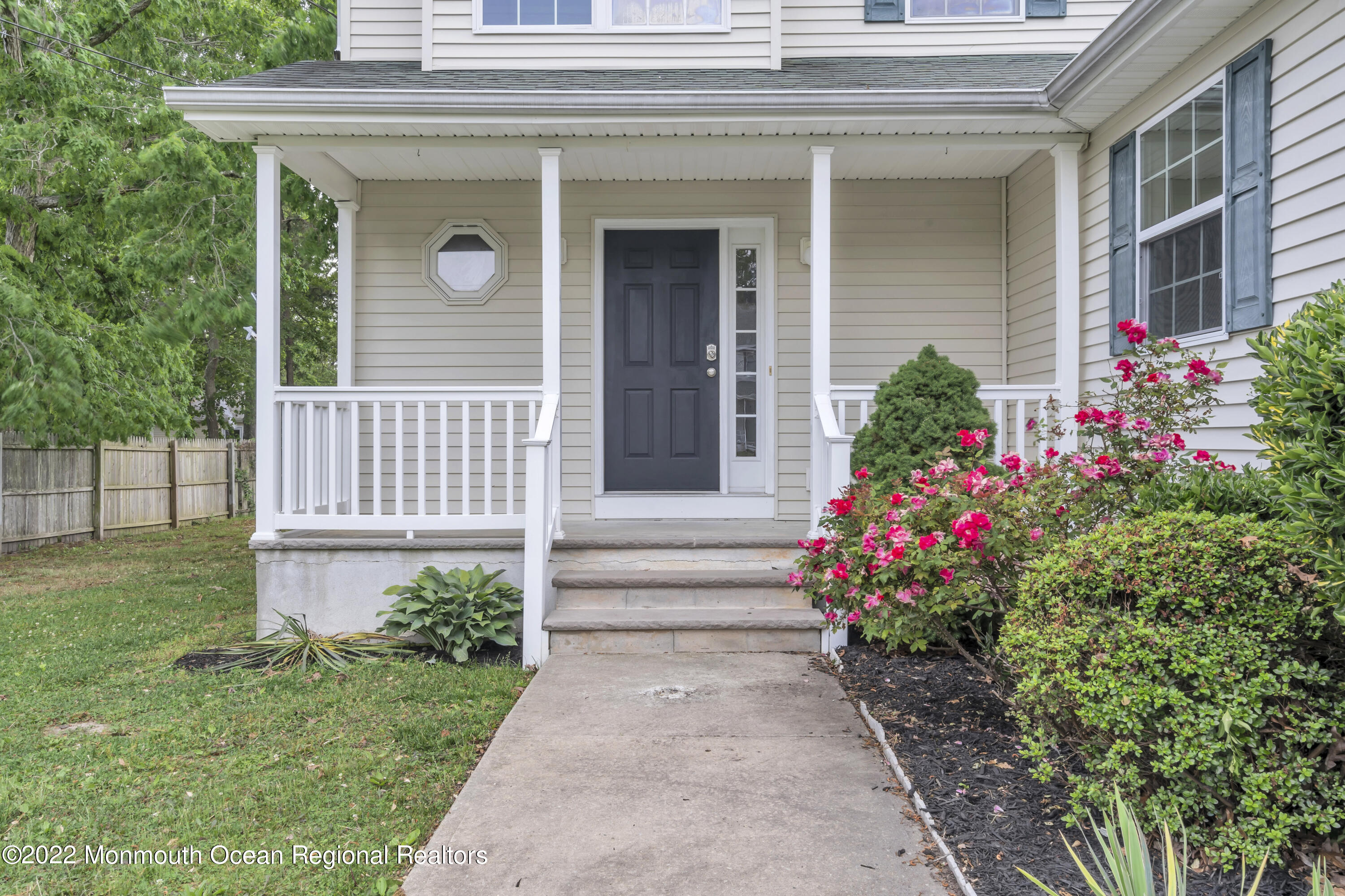 145 Gunwale Road Manahawkin, NJ 08050 - Photo 3 of 44 a front view of a house having yard