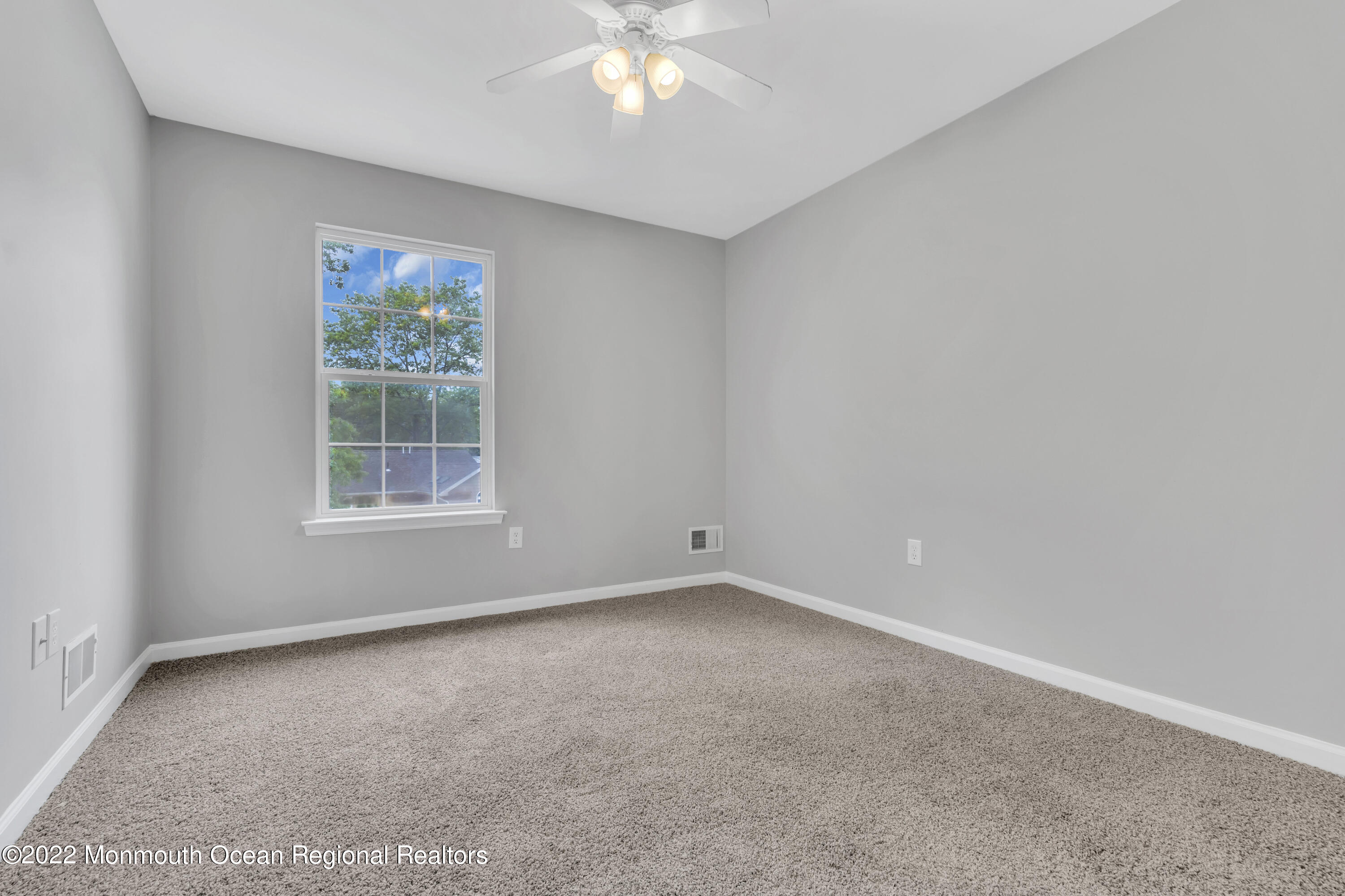 145 Gunwale Road Manahawkin, NJ 08050 - Photo 31 of 44 an empty room with a window