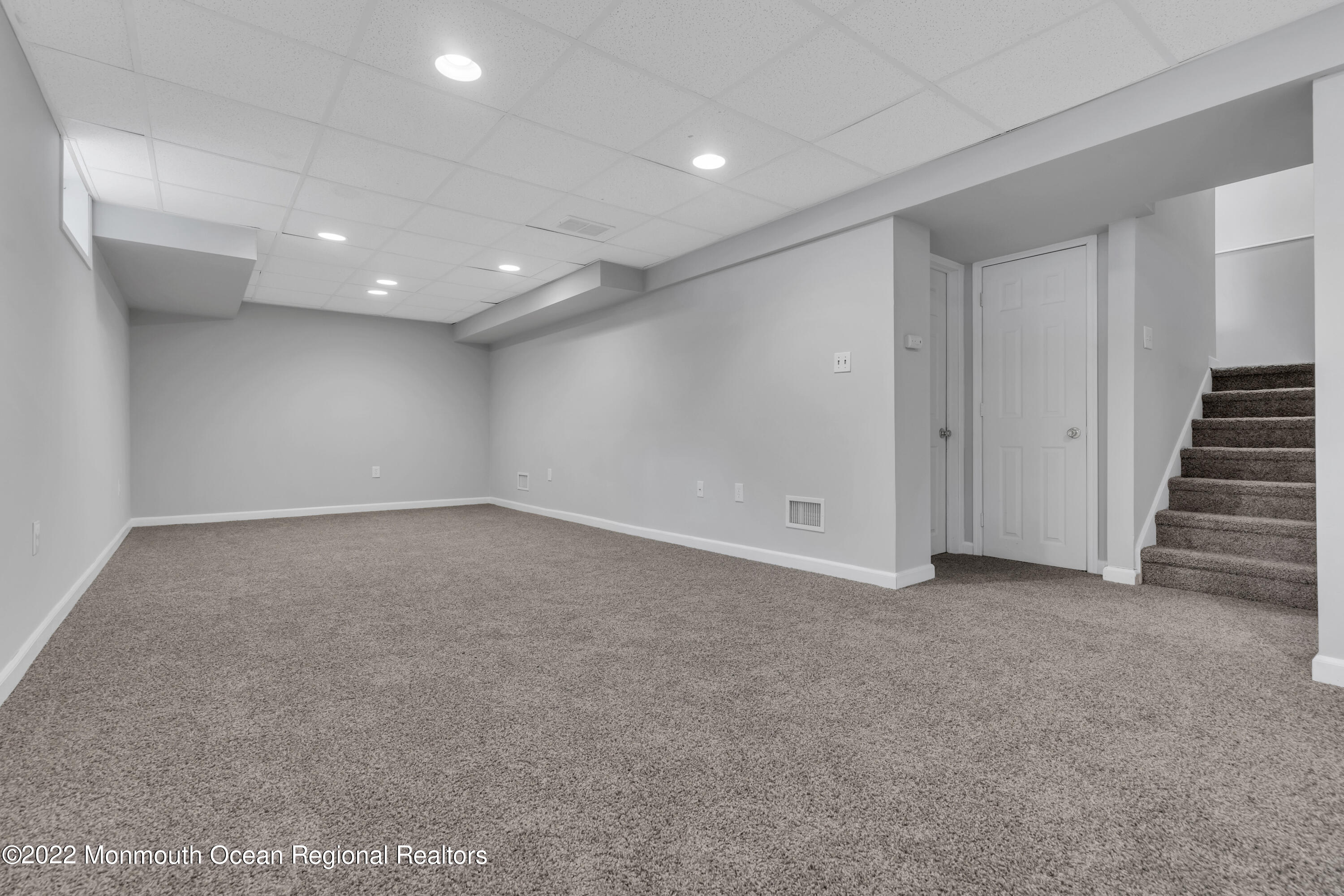 145 Gunwale Road Manahawkin, NJ 08050 - Photo 33 of 44 a view of an empty room with wooden floor