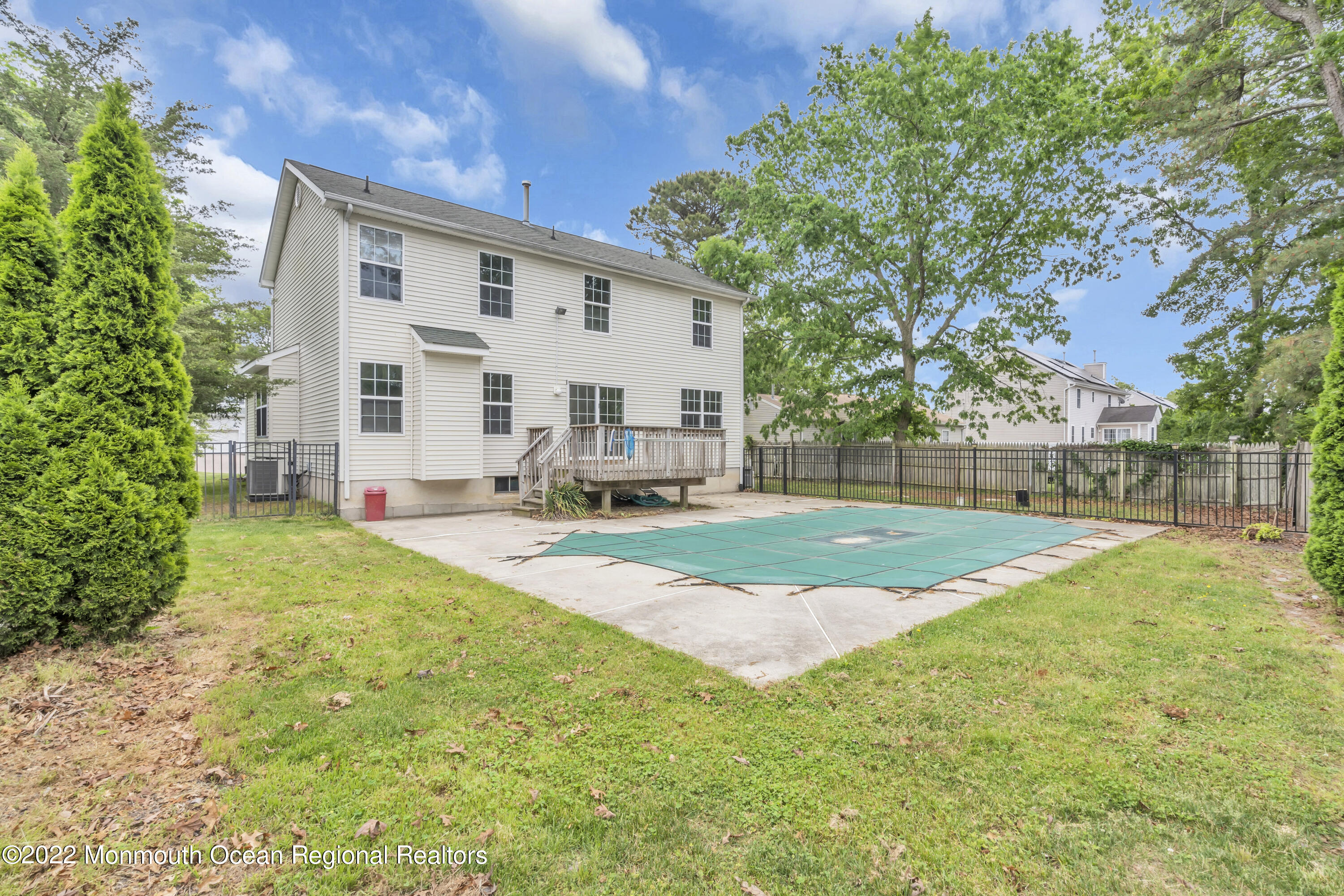 145 Gunwale Road Manahawkin, NJ 08050 - Photo 39 of 44 a view of backyard with swimming pool and seating space