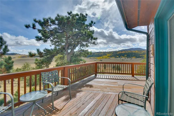 a view of a terrace with a garden