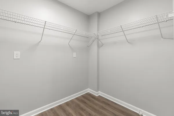 a view of a room with racks on the wall