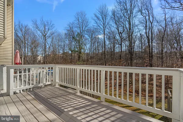 a view of a wooden roof deck
