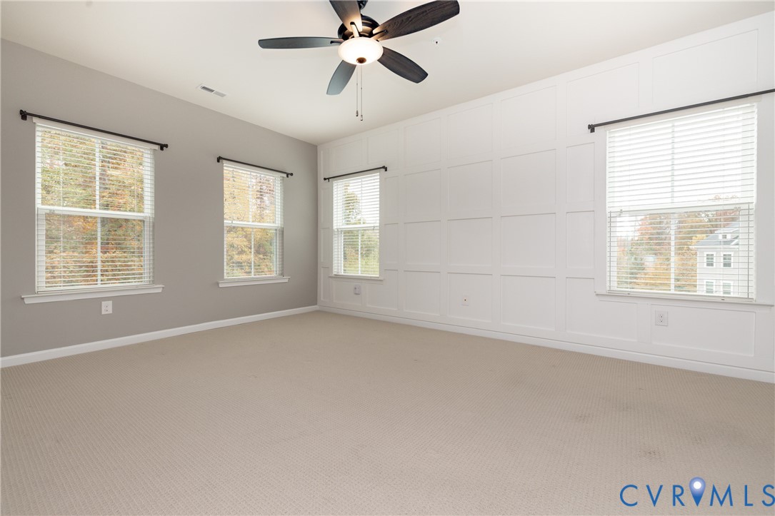 1111 Briars Court, Unit 303 Midlothian, VA 23114 - Photo 15 of 41 a view of an empty room with a window