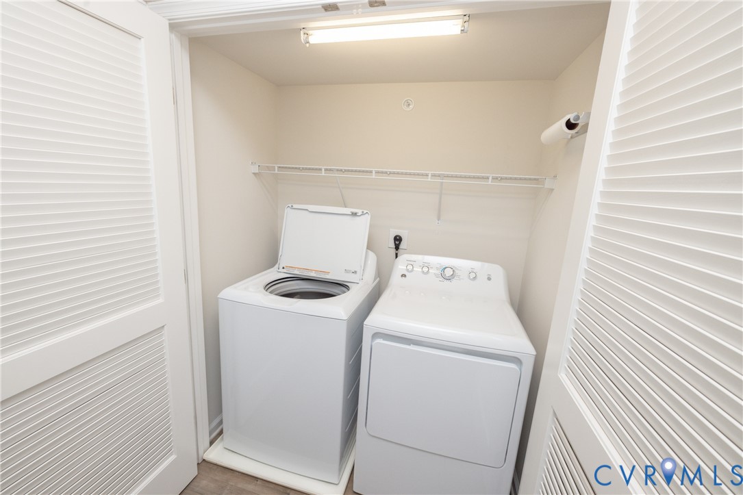 1111 Briars Court, Unit 303 Midlothian, VA 23114 - Photo 22 of 41 a utility room with dryer and washer