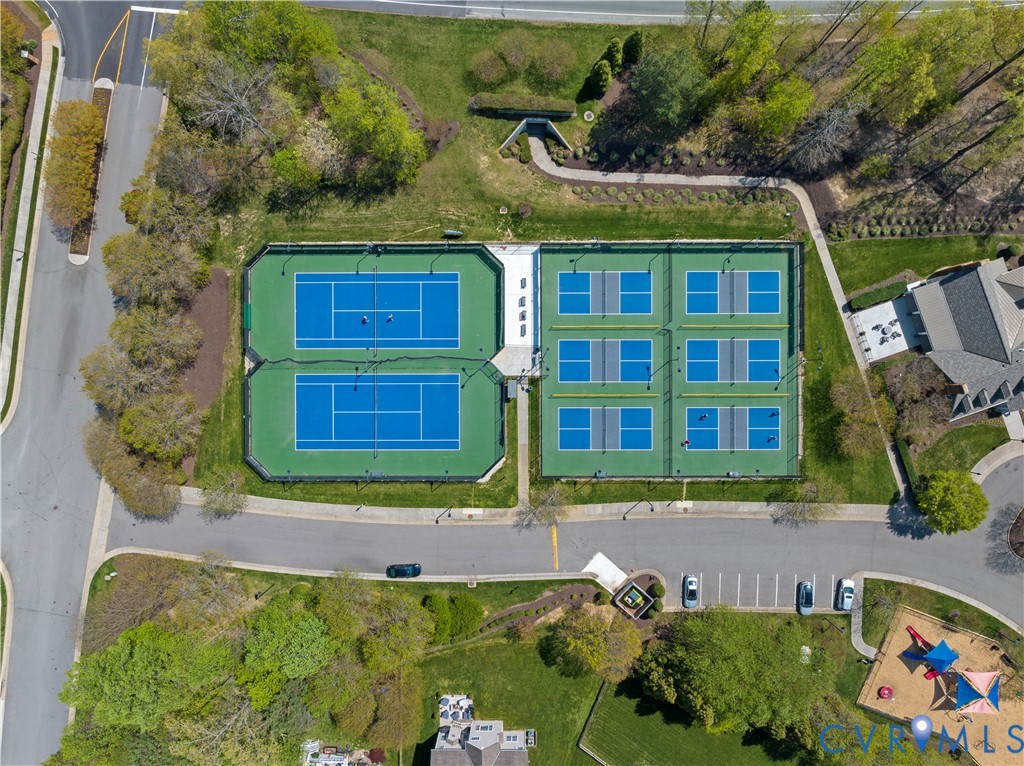1111 Briars Court, Unit 303 Midlothian, VA 23114 - Photo 34 of 41 a front view of a house with a yard