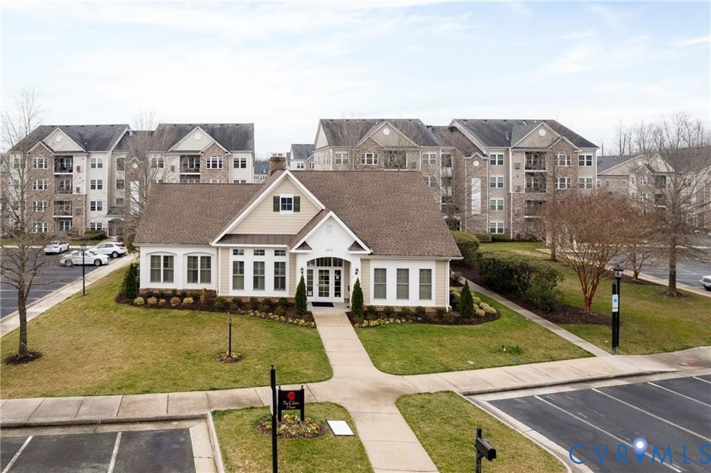 1111 Briars Court, Unit 303 Midlothian, VA 23114 - Photo 40 of 41 an aerial view of a house with swimming pool