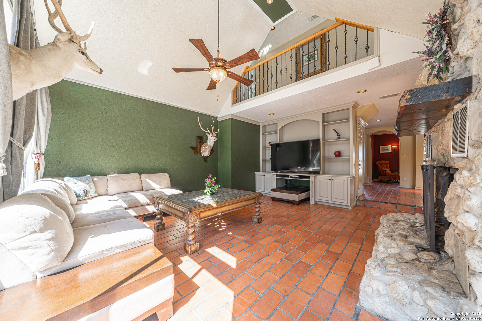 1839 Thanksgiving Road Utopia, TX 78884 - Photo 23 of 96 a view of a livingroom with furniture and a flat screen tv