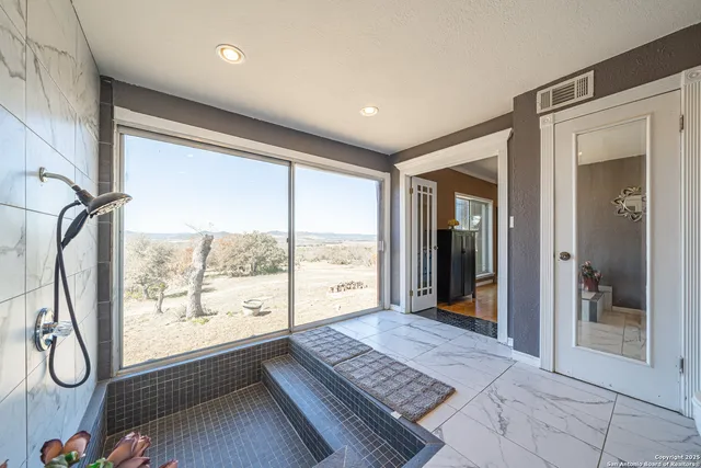 a view of swimming pool from a lake view