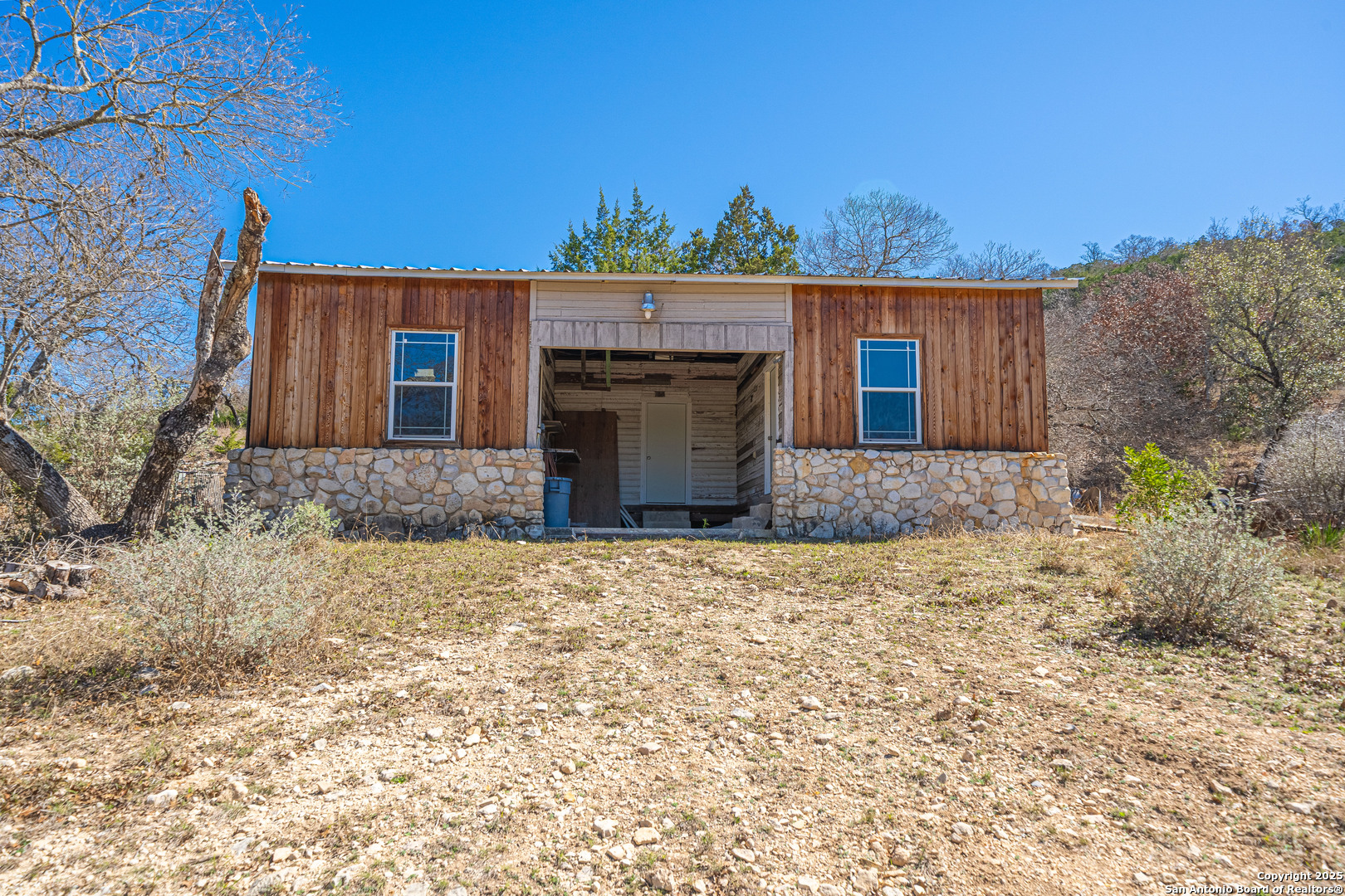 1839 Thanksgiving Road Utopia, TX 78884 - Photo 64 of 96 front view of a house with a yard