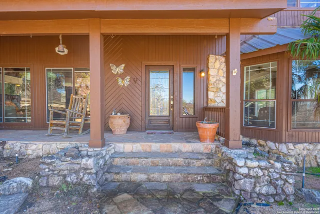 a kitchen with stainless steel appliances granite countertop a stove and a refrigerator