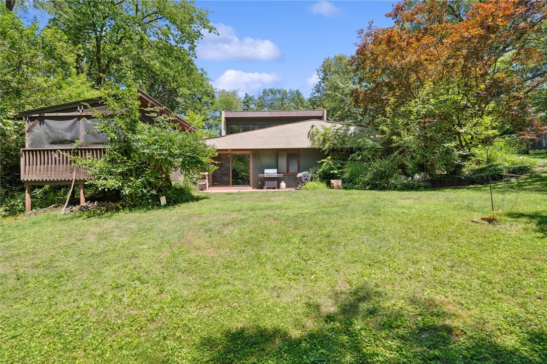 1940 Armstrong Road Fairborn, OH 45324 - Photo 37 of 48 This spacious property offers a serene outdoor living area, surrounded by lush landscaping.