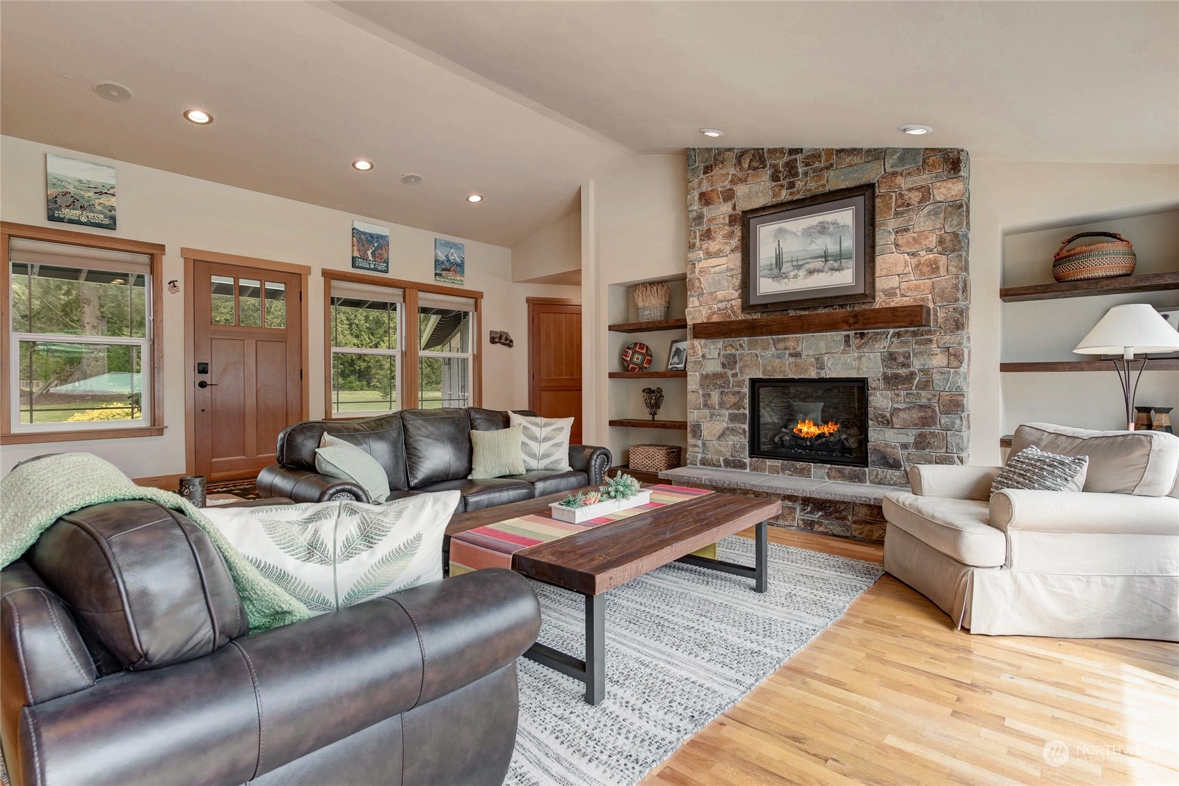 11821 Wagner Road Monroe, WA 98272 - Photo 18 of 40 a living room with furniture and a fireplace