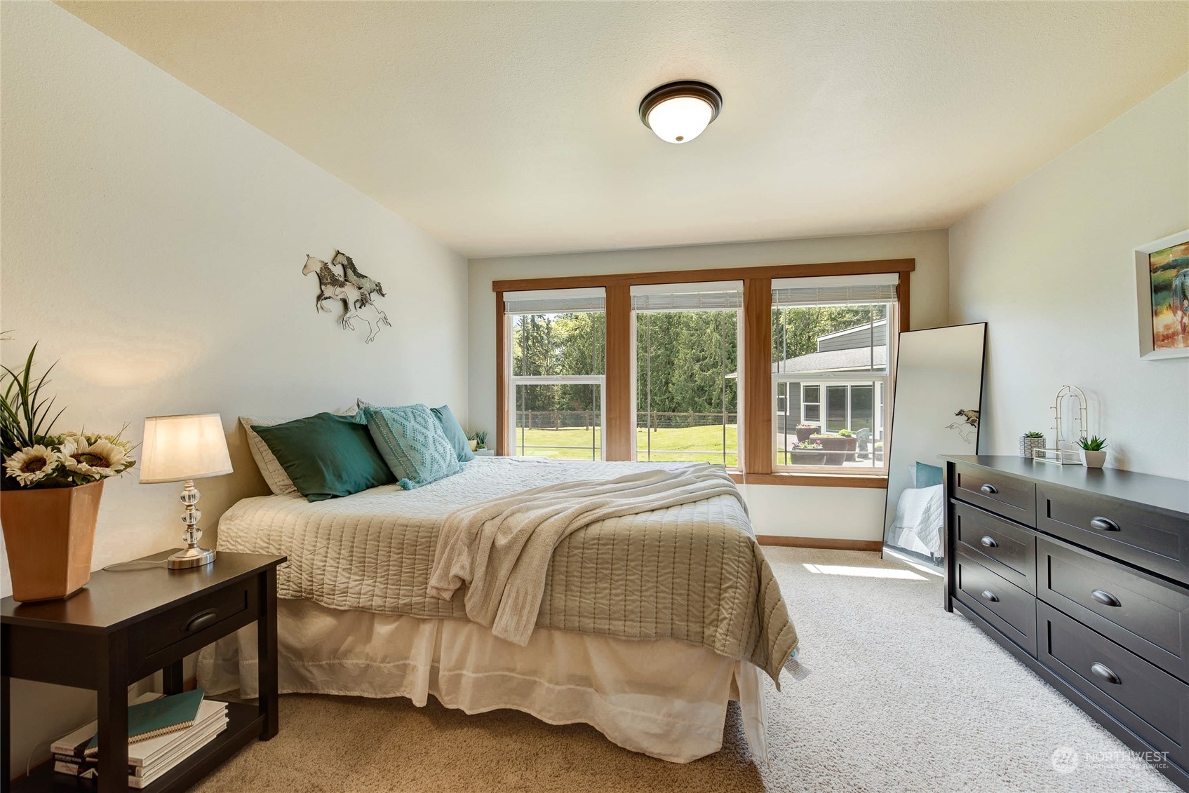 11821 Wagner Road Monroe, WA 98272 - Photo 27 of 40 a bedroom with a bed and window